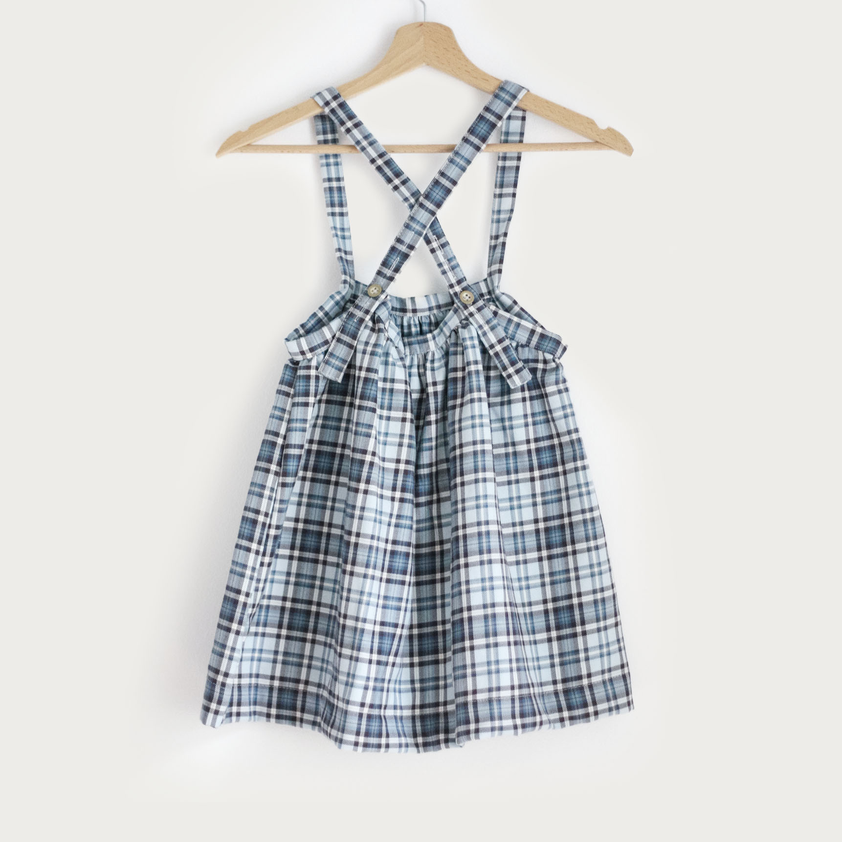 Sukně kostkovaná s kšandami